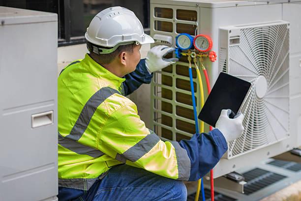 Professional Hvac technician working in Aztec, NM